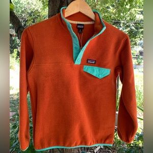 PATAGONIA Kids’ Medium Synchilla half snap jacket, orange and teal fleece